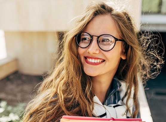 Woman smiling outside